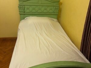 2 single beds and 2 comodes